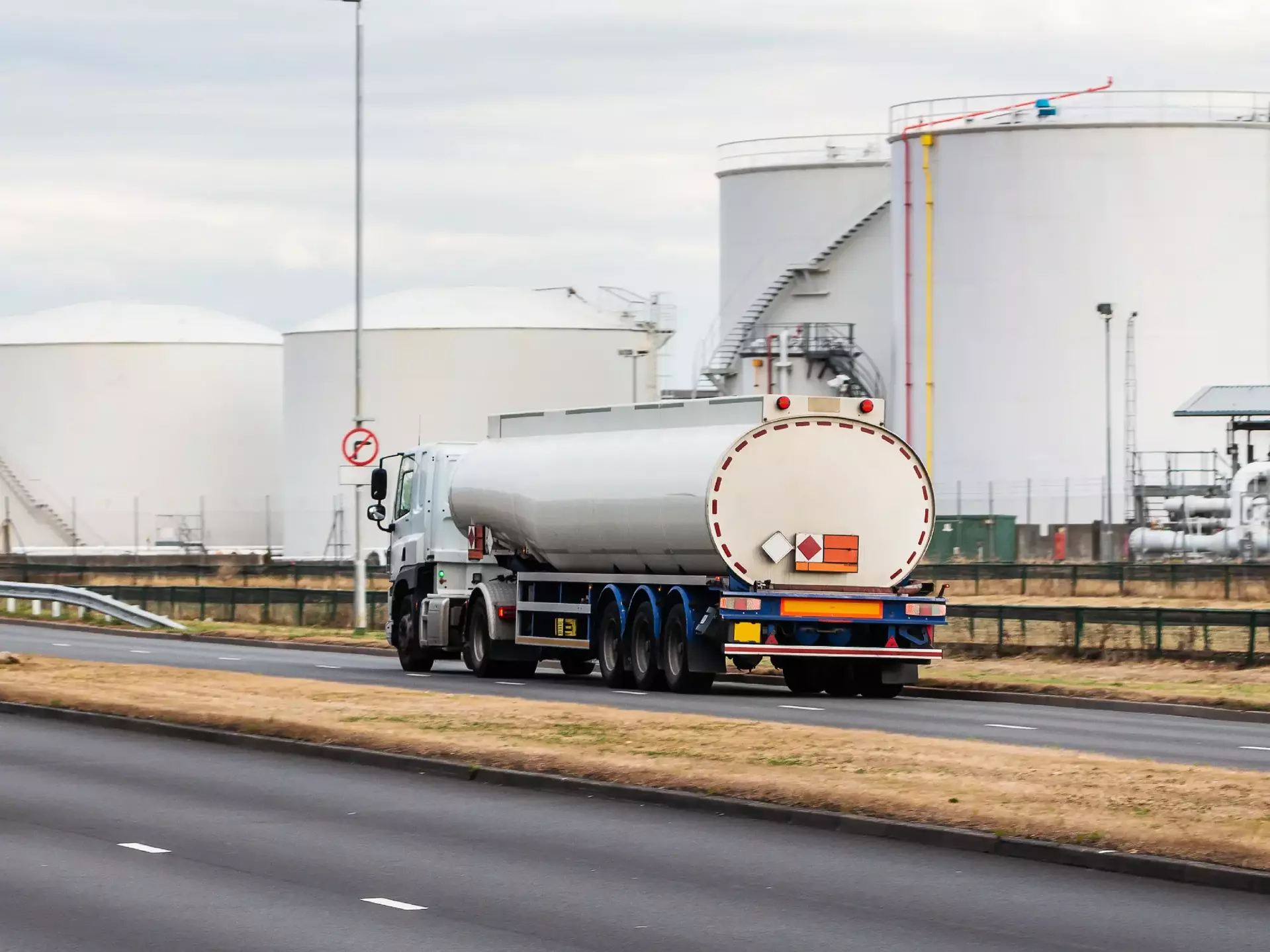 Tanker lorry in motion on the road Tanker lorry in motion on the road