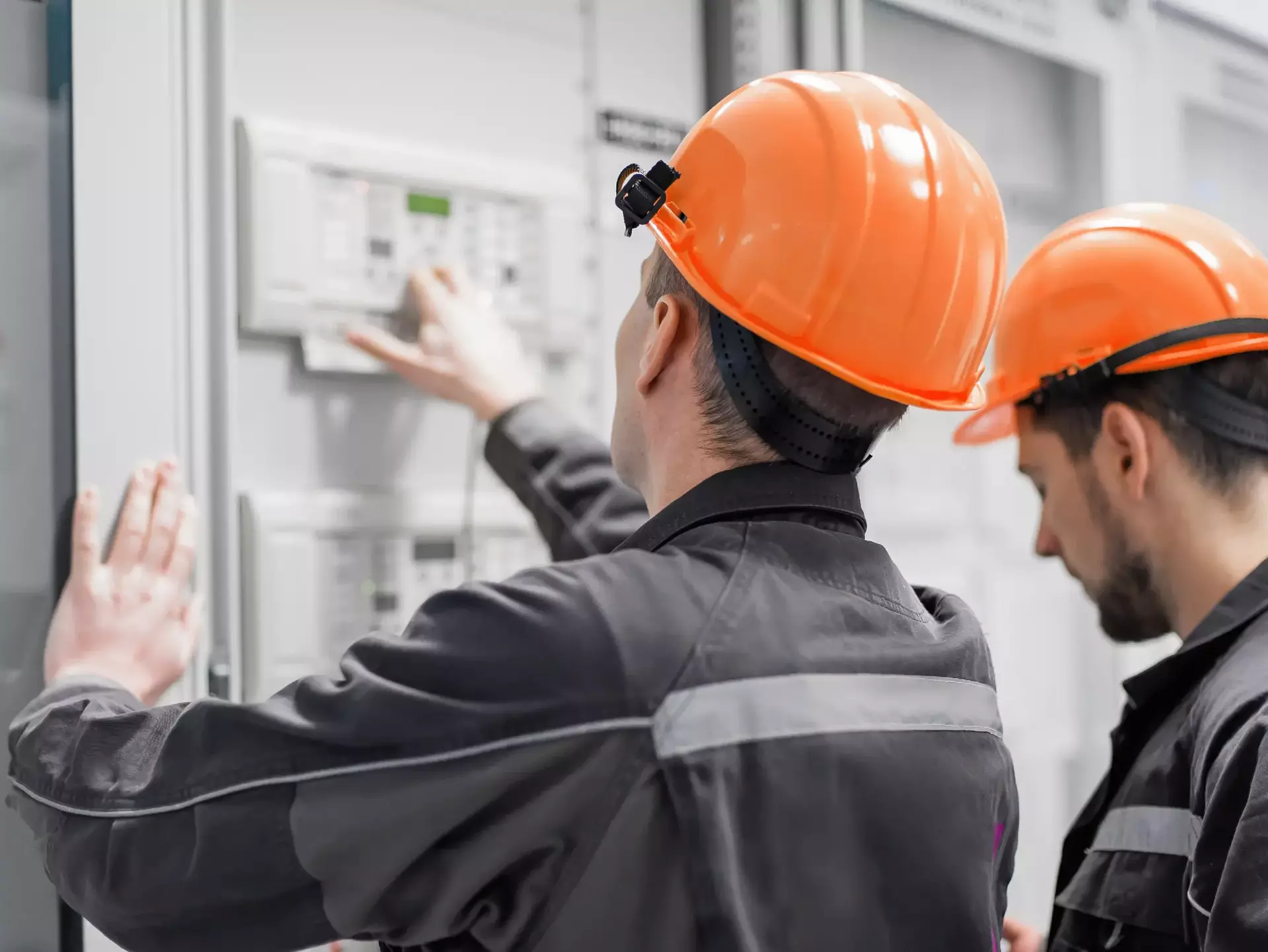 Field service crew testing electronics or inspecting electrical installation system Field service crew testing electronics or inspecting electrical installation system