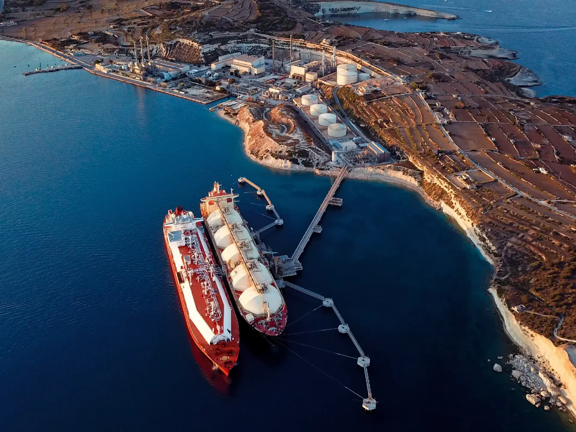 Aerial view of liquefied natural gas Ing tankers moored at harbour Aerial view of liquefied natural gas Ing tankers moored at harbour